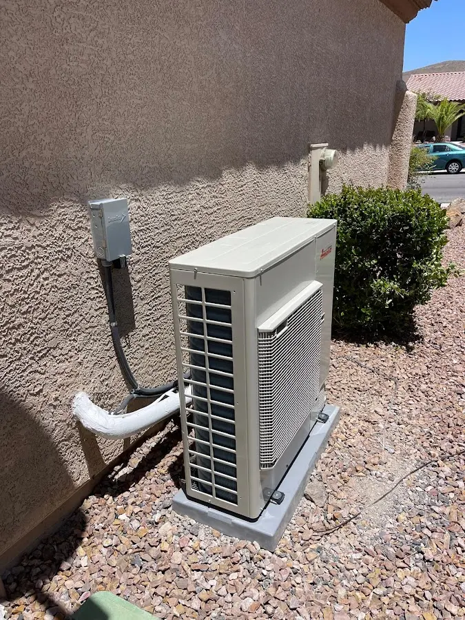 Residential air conditioning condenser unit in Tuba City